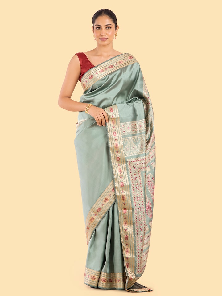 Side view of Sage green mulberry silk Baluchari saree showcasing fabric texture