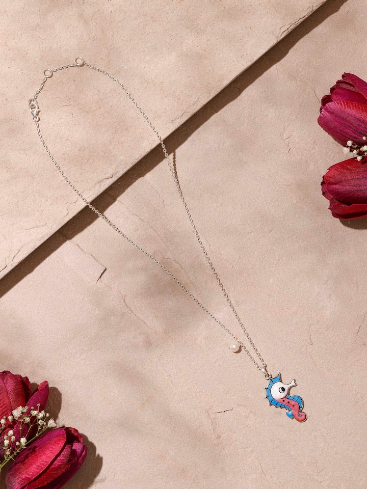 Side view of Gulabi Meenakari Silver Pendant & Chain by Swadesh showcasing intricate meenakari work and delicate silver chain