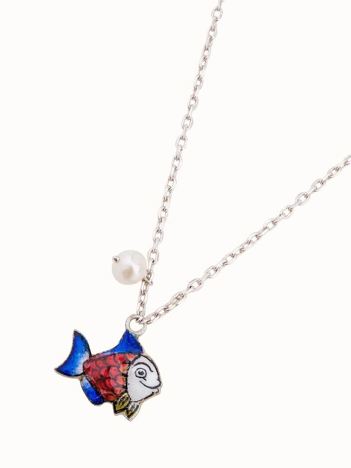 Overhead shot focusing on the bracelet’s curved form and bright Meenakari patterns