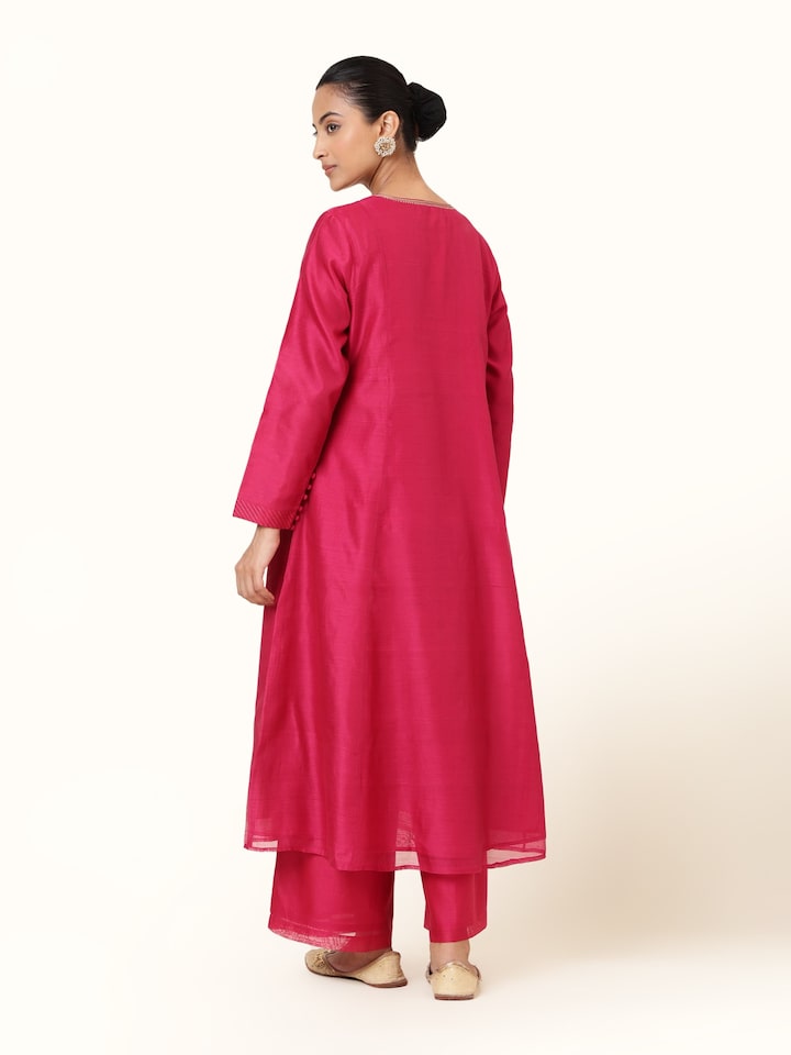 Back view of fuschia Chanderi palazzo with soft pleats and natural drape
