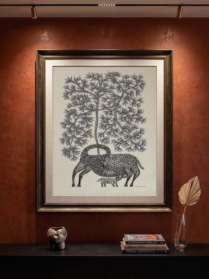 Styled view of Calf Under Mother Tree Gond Art displayed against a styled backdrop