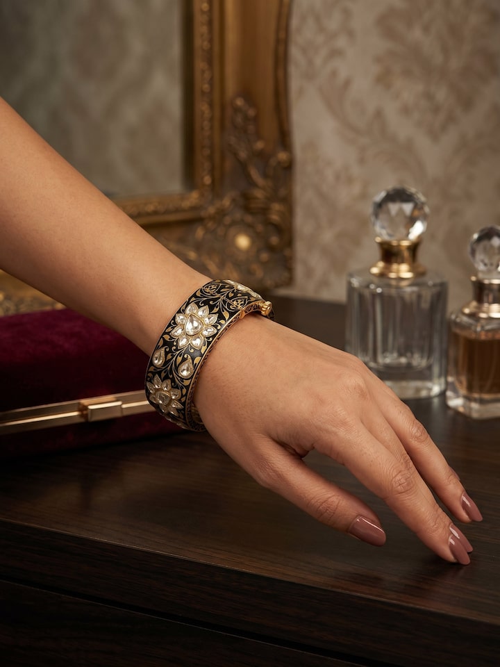 Styled view of Meenakari Nathdwara Silver Gold Plated Bangle worn on the ear, showing how it looks styled