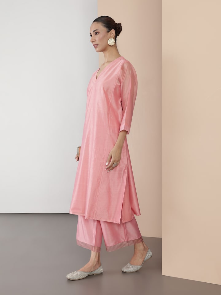 Side view of pink cotton silk kurta highlighting the soft texture and minimalist design.