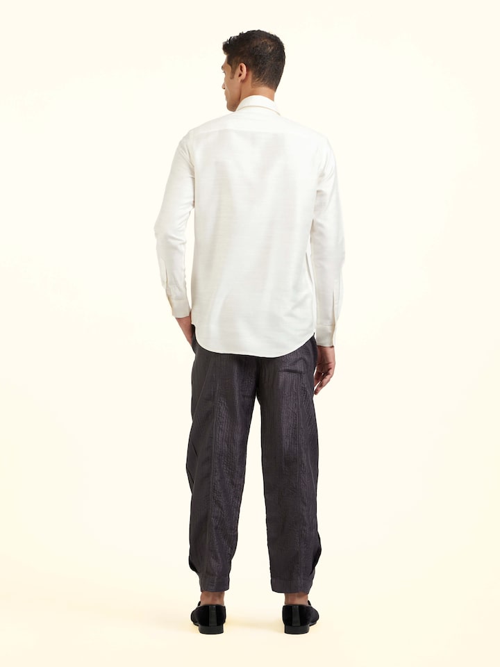Back view of white hand embroidery shirt displaying neat finish and classic silhouette