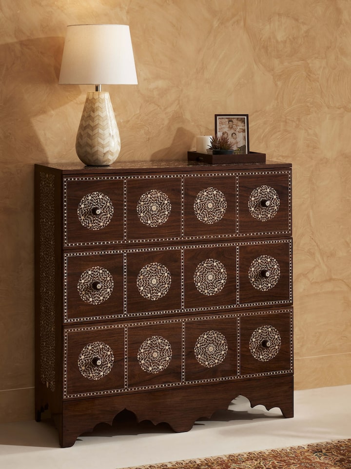 Styled view of Sheesham Wood & Bone Inlay Chest of Drawers styled in a room setting
