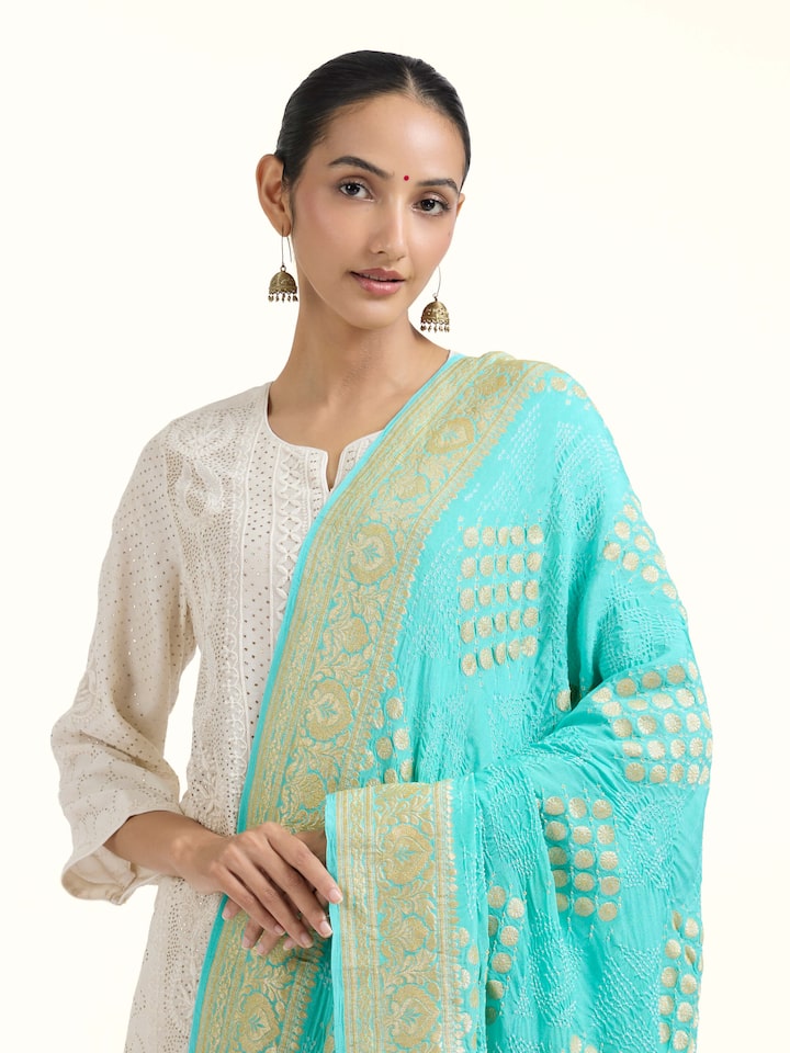Angled view of Turquoise Bandhani Tie & Dye Dupatta revealing the depth of its color and intricate pattern