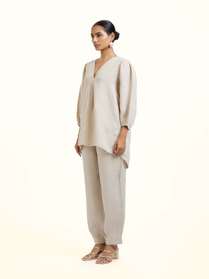Side view of Natural Chikankari Linen Top showing the side fit and silhouette