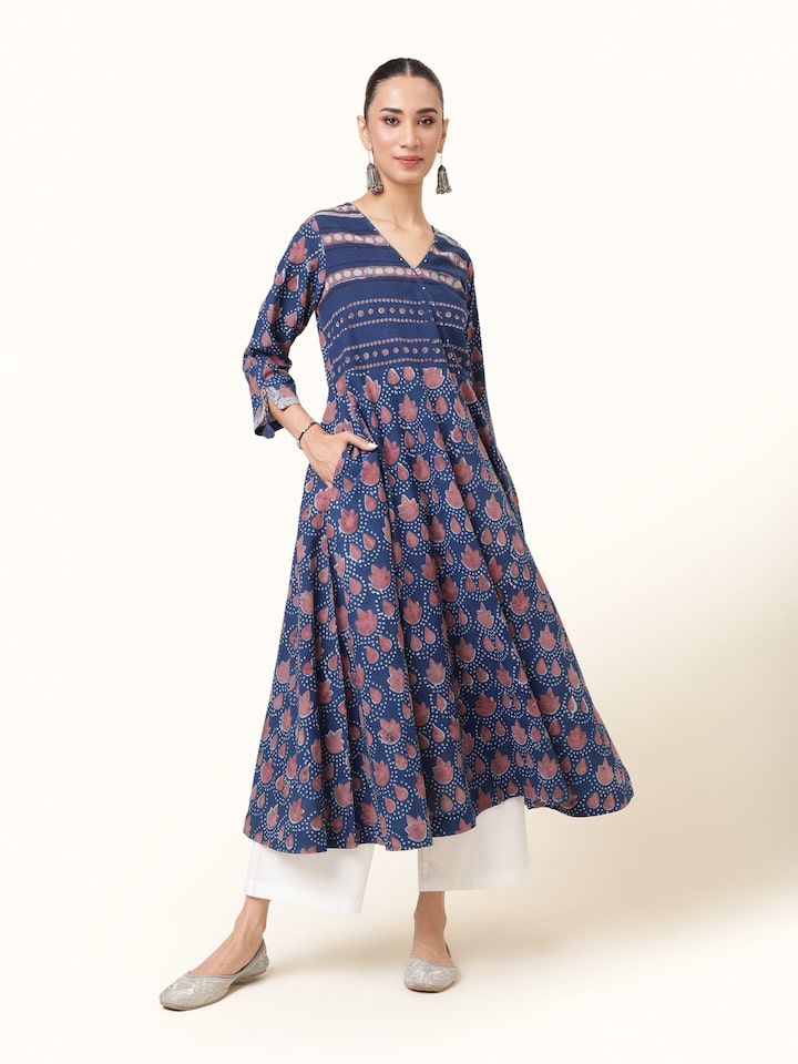 Front view of blue cotton Dabu block print A-line kurta with bold traditional motifs.