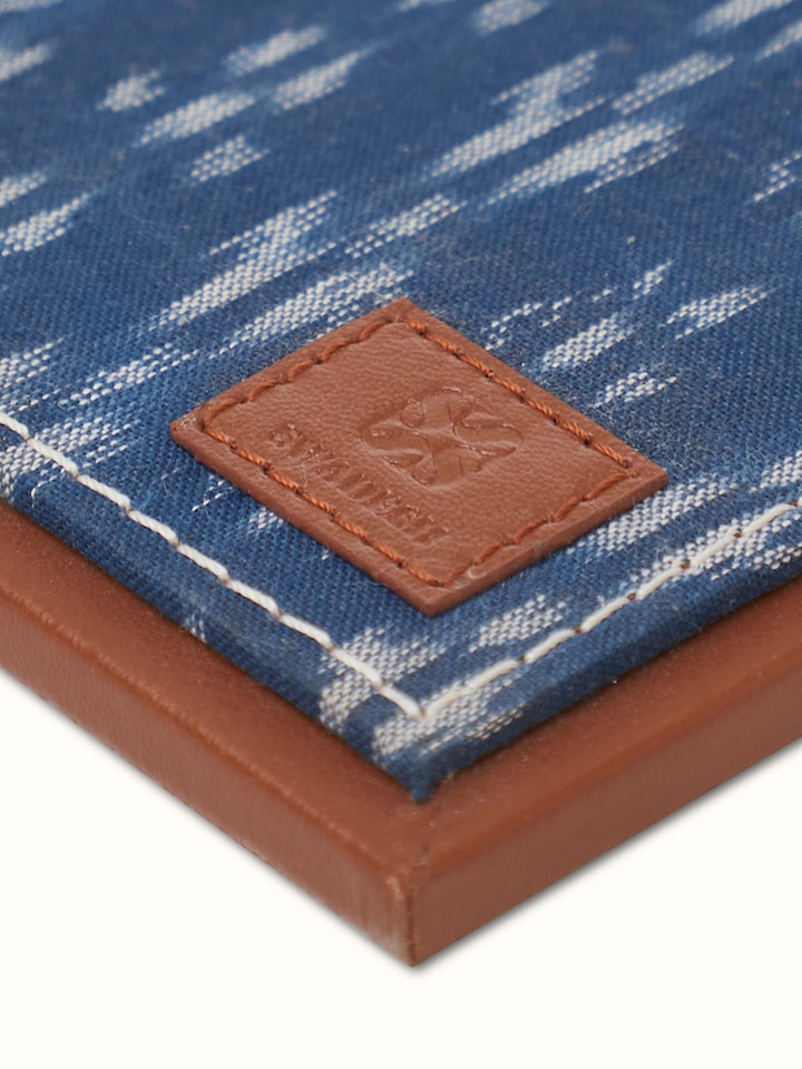 Artistic view of Swadesh Leather Desk Blotter in blue emphasizing its smooth surface and premium quality finish.