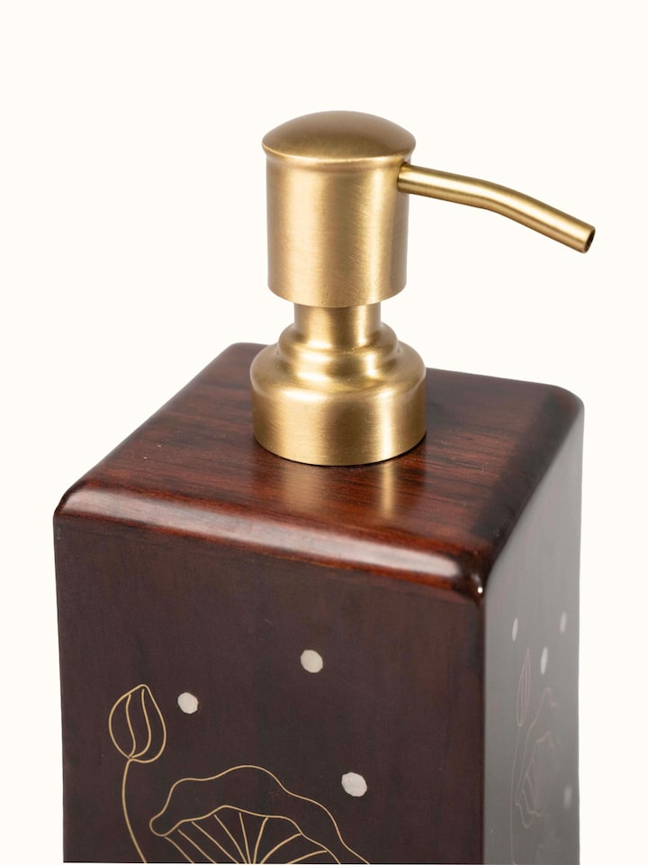 Detail view of Kamal Tarkashi Teak Wood Soap Dispenser highlighting the packaging label detail