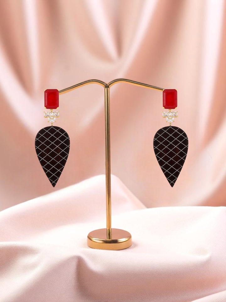 lifestyle view of tarkashi silver drop earrings