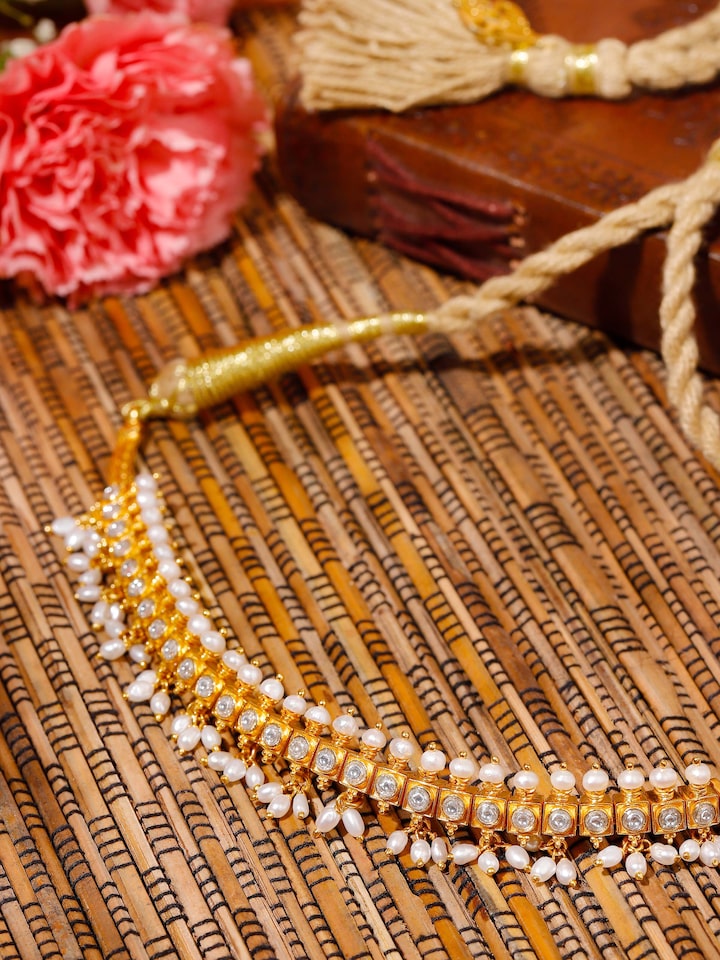 Styled detail view of Guttapusalu Silver Choker worn around the neck, shown in another styled shot