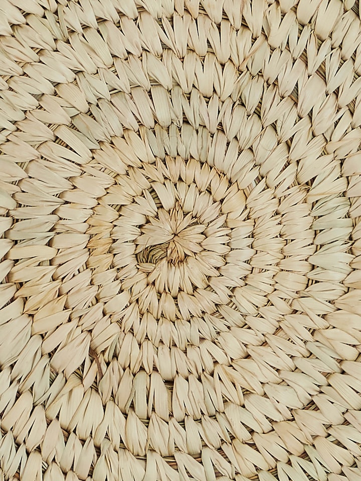 Artistic close-up capturing the weave pattern and subtle variations in fibre color and texture