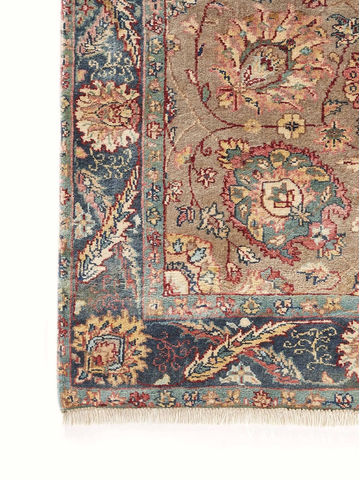 Angled side view emphasizing the texture, thickness, and hand-knotted craftsmanship