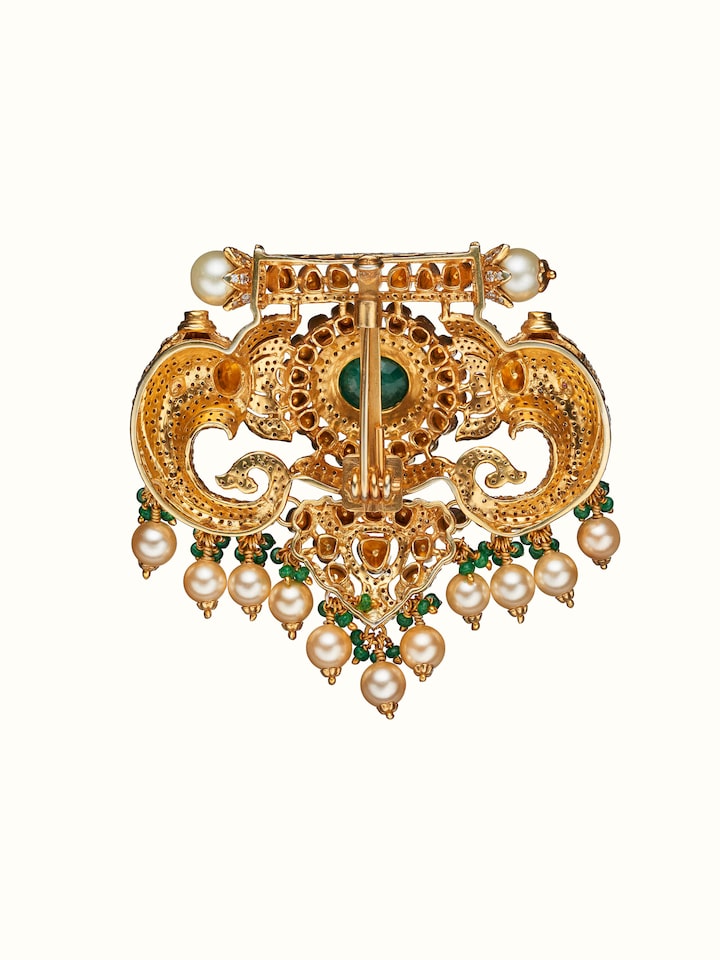 back view of silver smithing yellow gold brooch pin with pin clasp