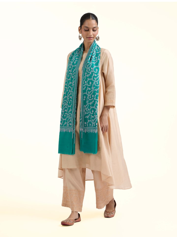 Side view of Wahida Pashmina Sozni Embroidered Stole draped over the shoulder showing the fall