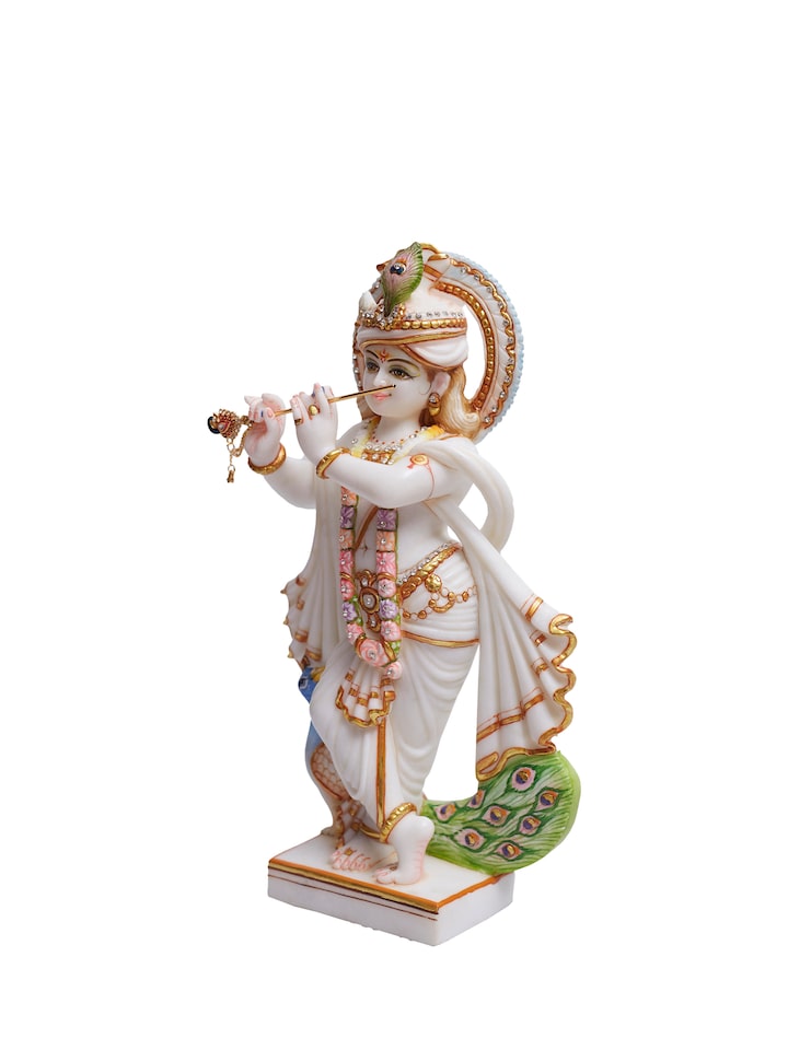 Angled view of Carved Marble Krishna Idol