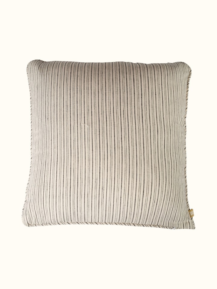 Folk geo hand embroidered checkered cushion cover, back view with fabric texture