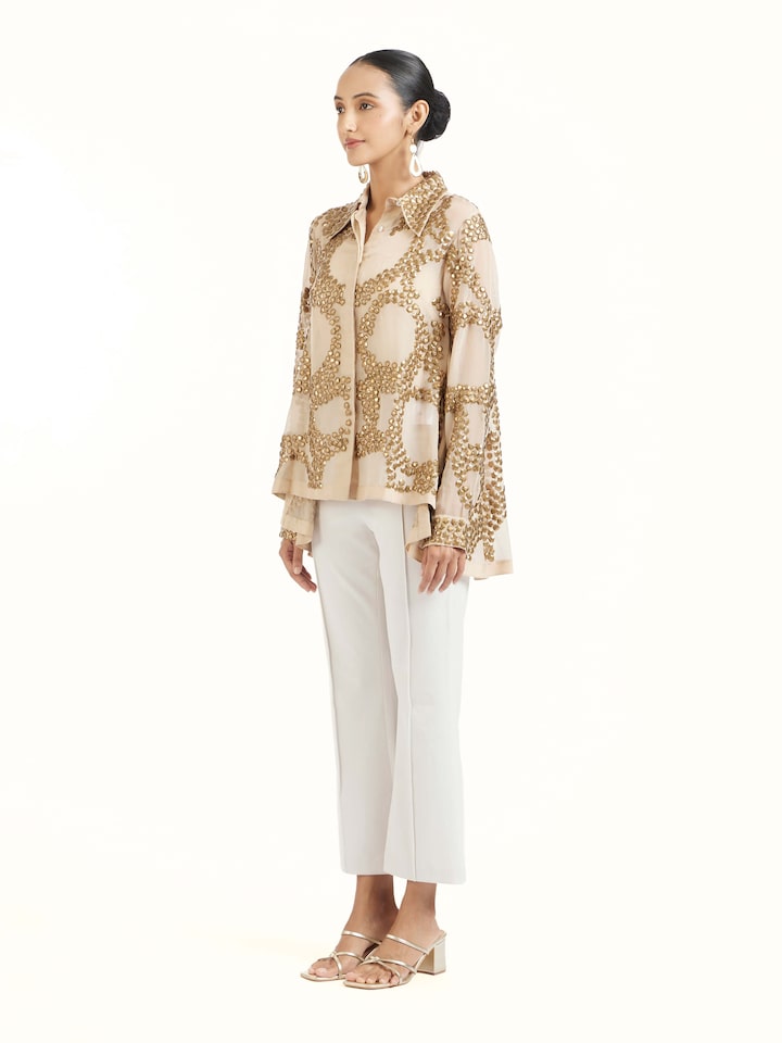 Side view of beige hand embroidered organza gold shirt showcasing tailored silhouette