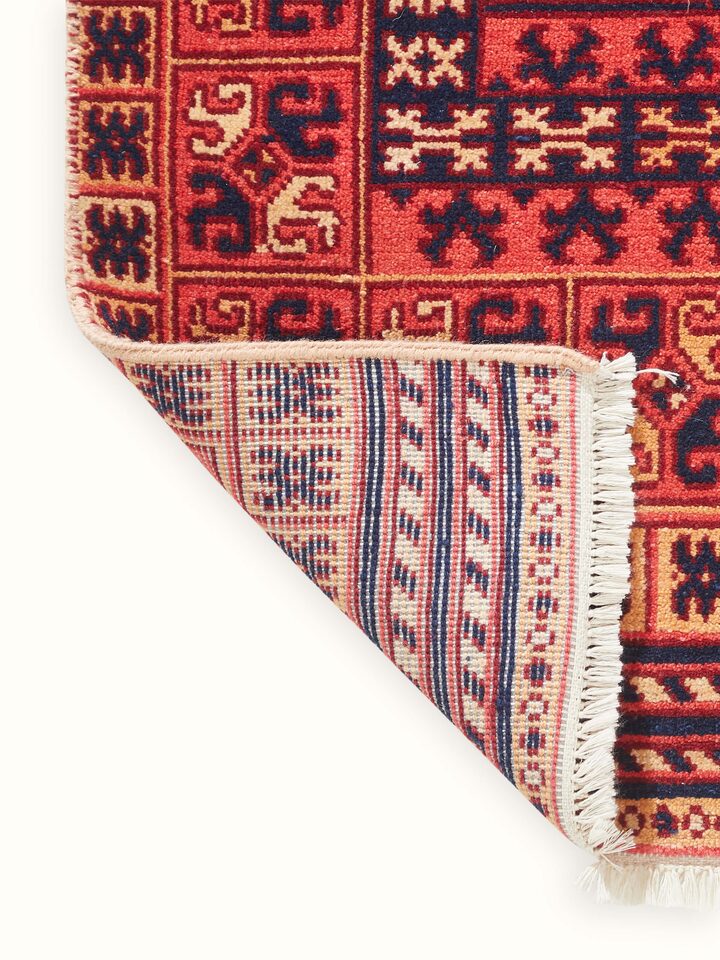 Back view revealing the sturdy hand-knotted underside and structural quality