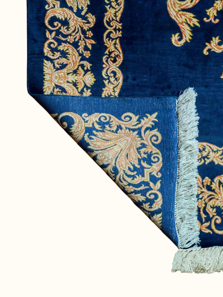 Side-angle view of the Traditional Persian Navy Opan Kashmir Silk Hand-Knotted Carpet