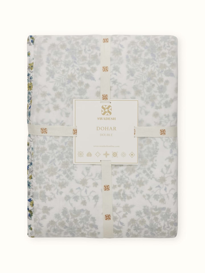 Rear side of dohar showing reverse pattern and soft cotton fabric.