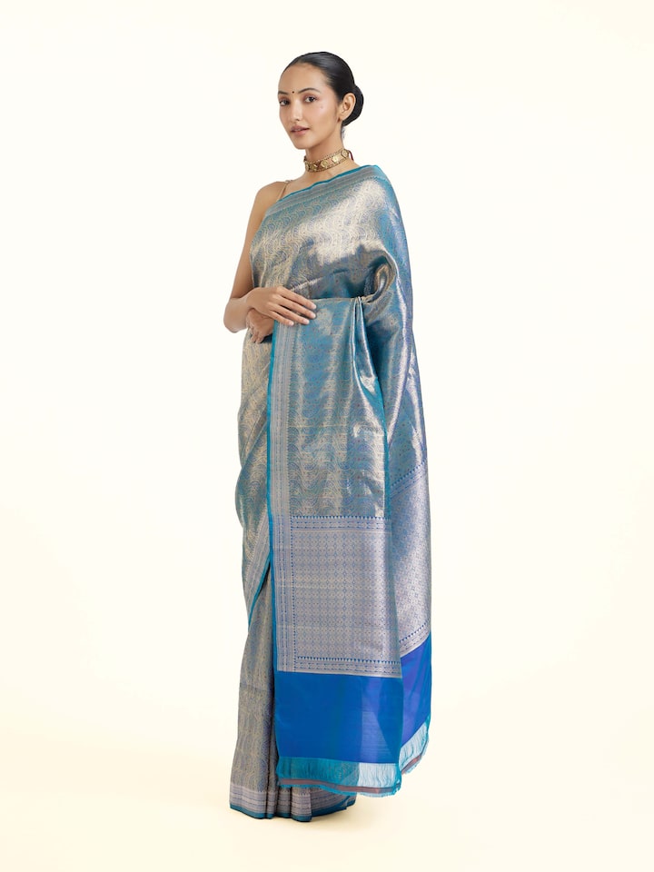 Side view of Blue Banarasi Tissue Silk Saree highlighting the detailed craftsmanship and elegant silhouette