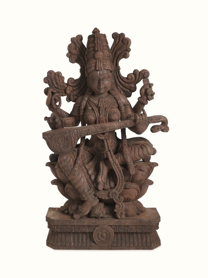 Front view of the Wood Carved Sitting Saraswati Idol
