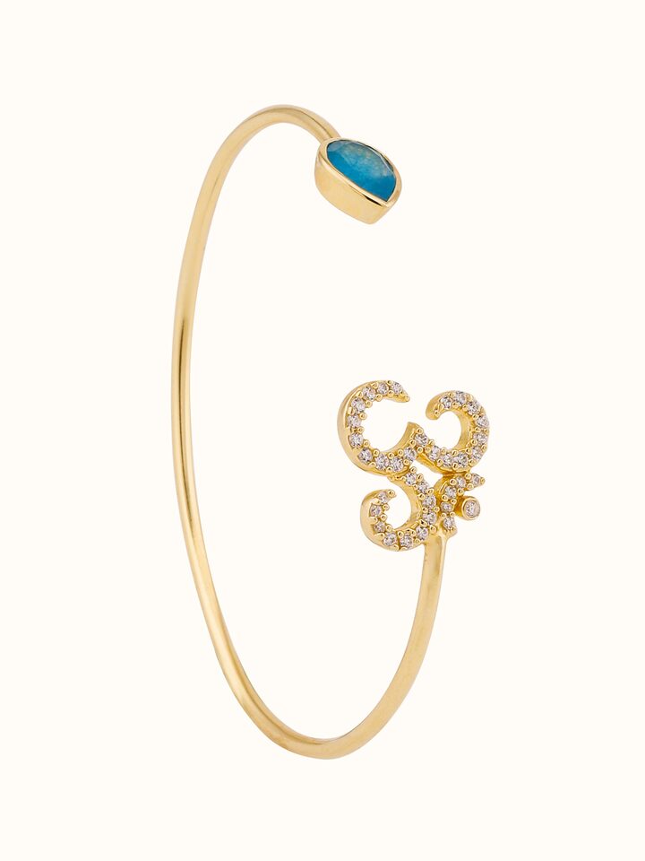 Front view of Green White Jade & Om 18K Gold Plated Silver Bracelet highlighting the polished jade beads and Om charm