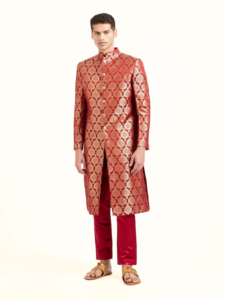 ront view of maroon silk Banarasi butidar sherwani with rich woven motifs