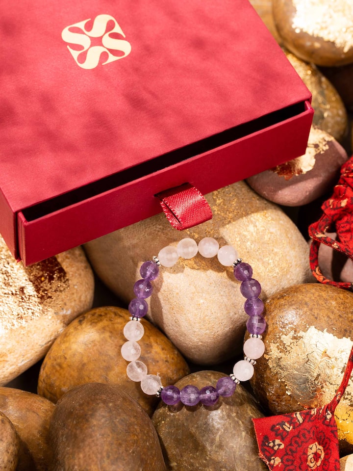 Close-up view of Amethyst & Rose Quartz Silver Bracelet showcasing the subtle pink and purple crystal textures