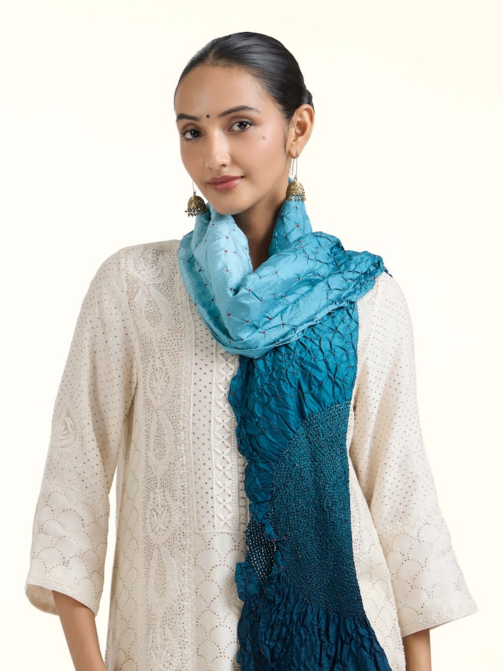 Angled view of Teal Bandhani Tie & Dye Silk Stole revealing the depth of its color and intricate pattern