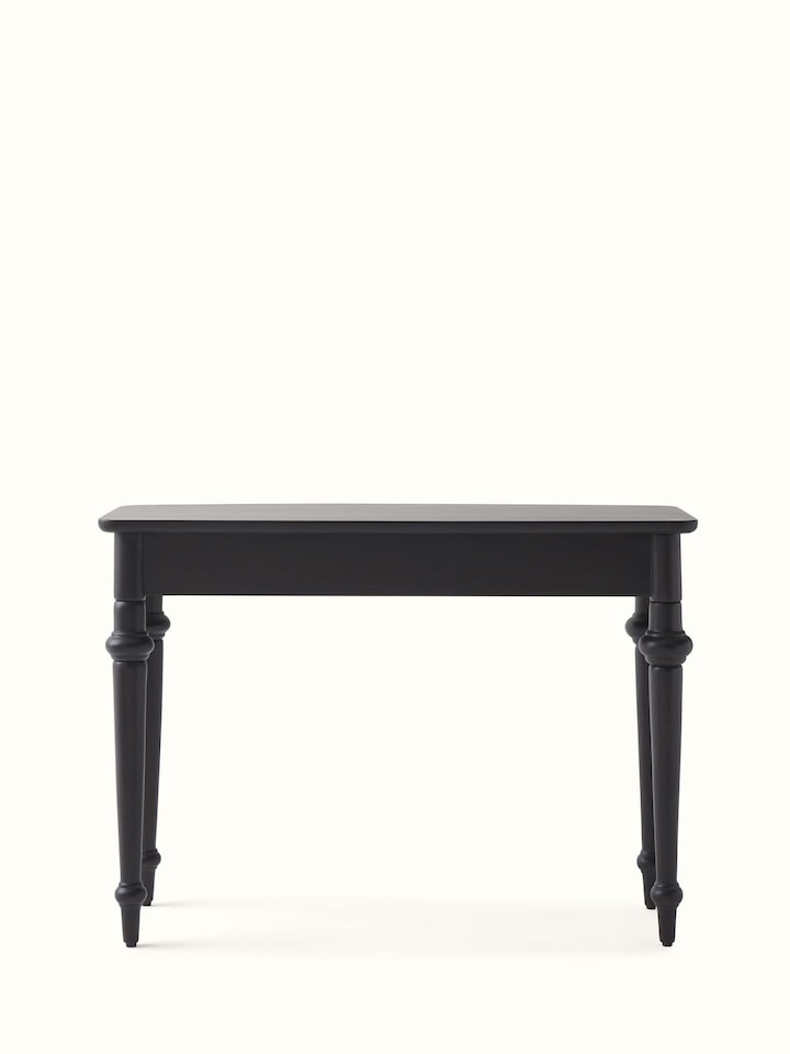 Side angle view of the Sheesham wood and brass tarkashi console table, showing its sleek and elegant design.