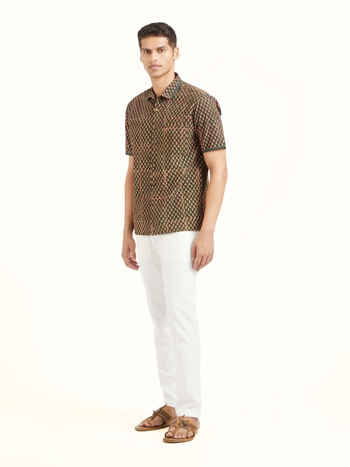 Side view of teal fadad hand block print pure cotton shirt highlighting relaxed fit