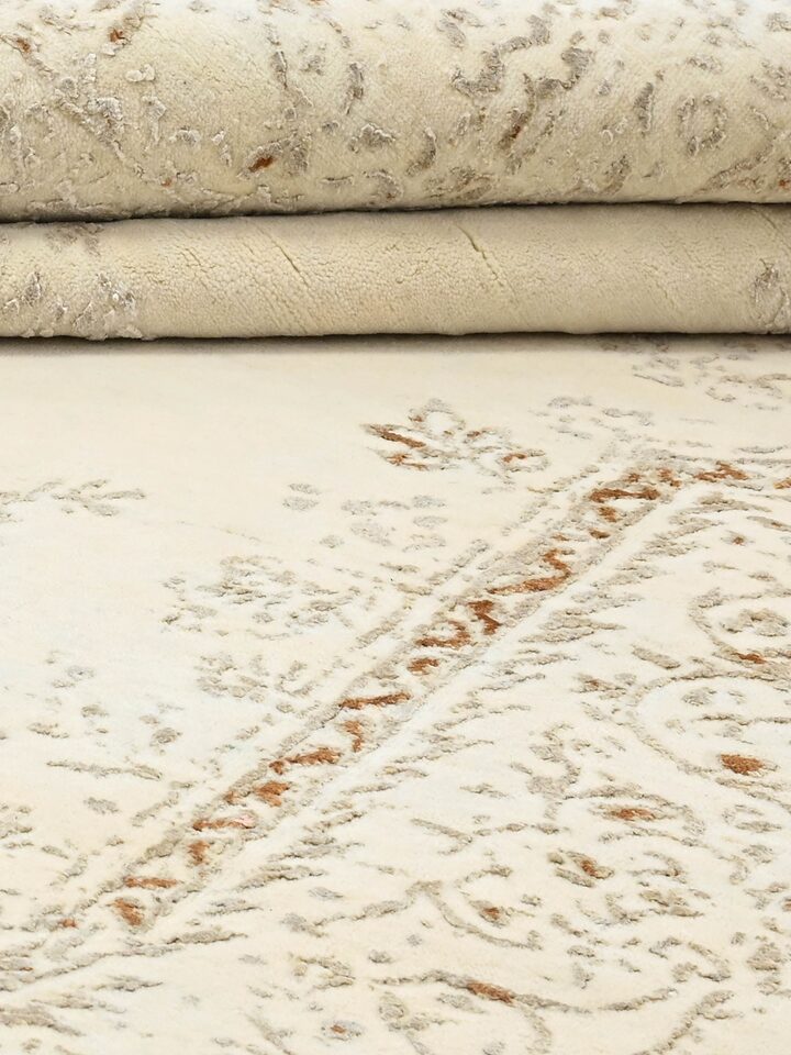 Detail view of Transitional Persian Ivory Bhadohi Wool & Bamboo Silk Hand Knotted Rug highlighting the intricate pattern and pile texture