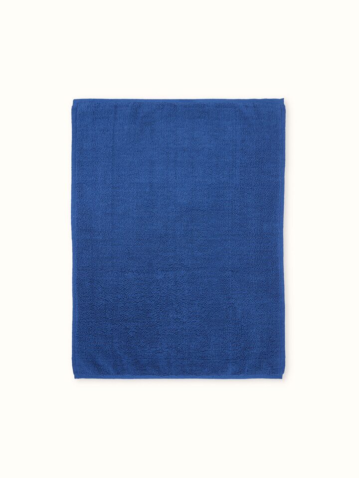 Nityam solid blue cotton bath mat – Swadesh