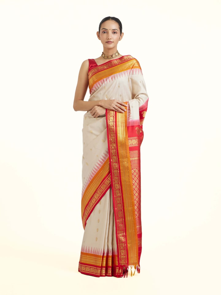 Front view of Cream Gadwal Silk Zari Saree showcasing its traditional craftsmanship and design