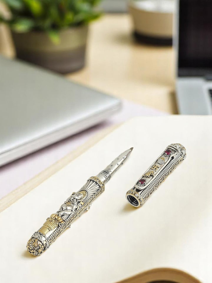 Styled view of Nakash Silver Ganesha Pen held in hand, showing how it looks styled
