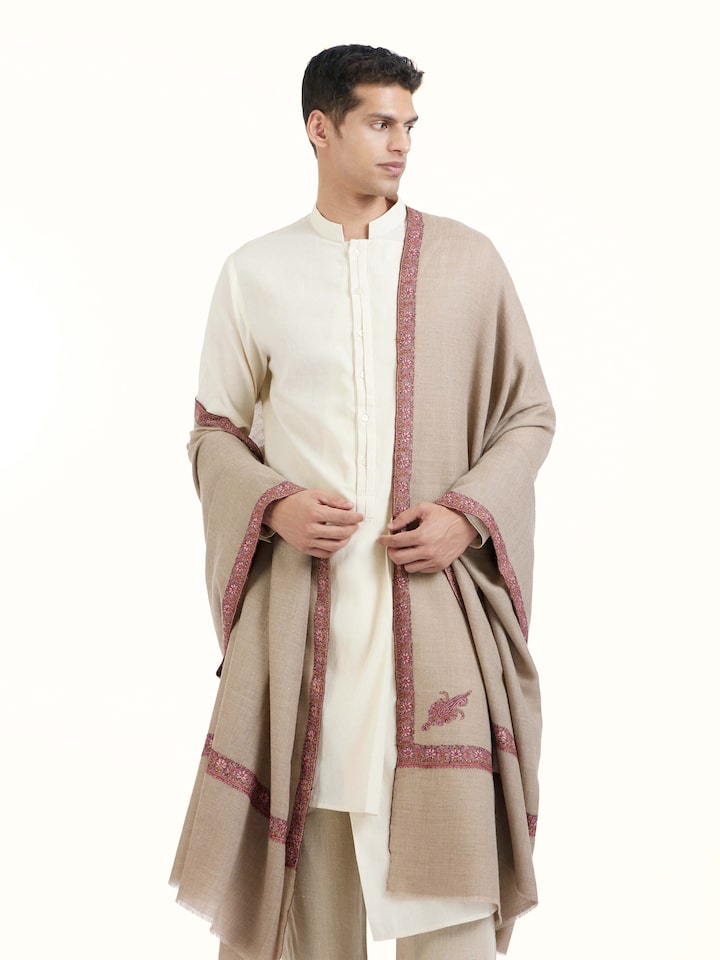 Angled view of Brown Sozni Hand Embroidered Shawl revealing the depth of its color and intricate pattern