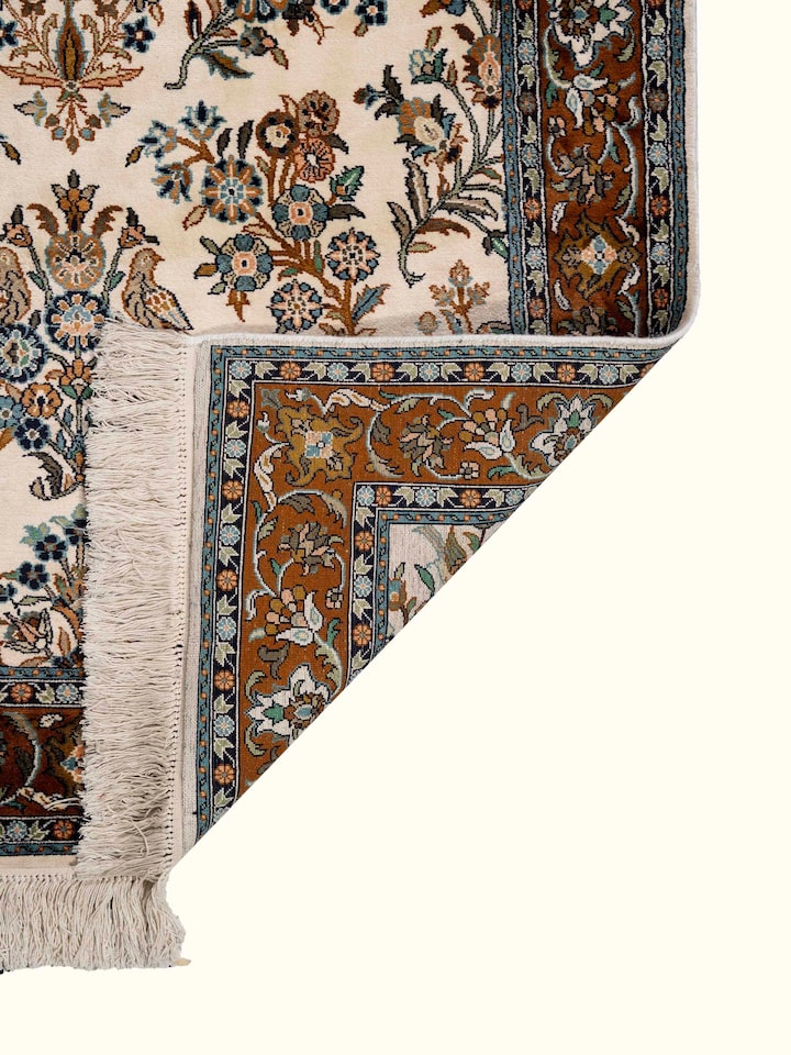 Back view of Traditional Persian Ivory Mahal Kashmir Silk Hand-Knotted Carpet showing the reverse weave