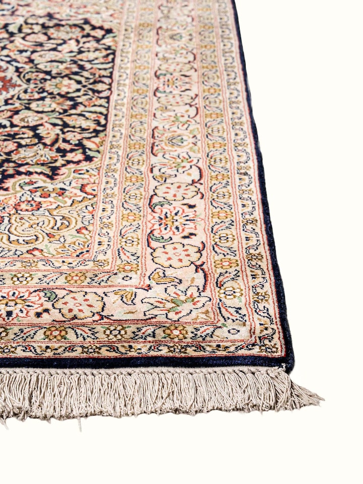 Close-up view of Traditional Persian Navy Kashan Kashmir Silk Hand-Knotted Carpet highlighting the hand-knotted weave and motif detail