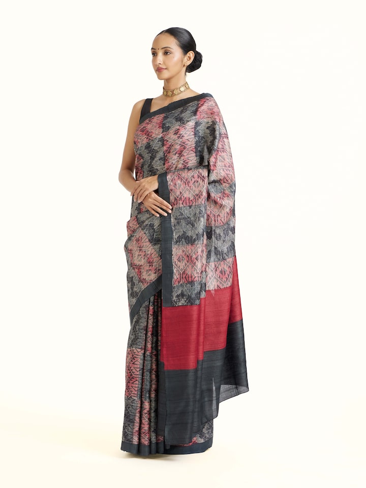 Side view of Black Tussar Silk Discharge Block Printed Saree highlighting the detailed craftsmanship and elegant silhouette