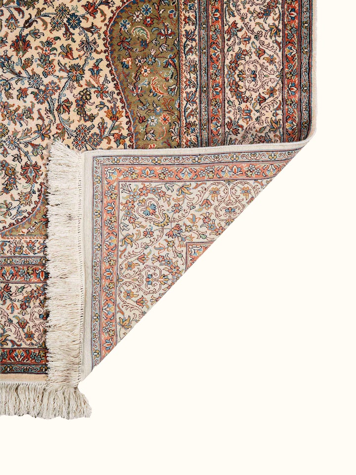 Back view of Traditional Persian Ivory Green Kerman Kashmir Silk Hand-Knotted Carpet showing the reverse weave