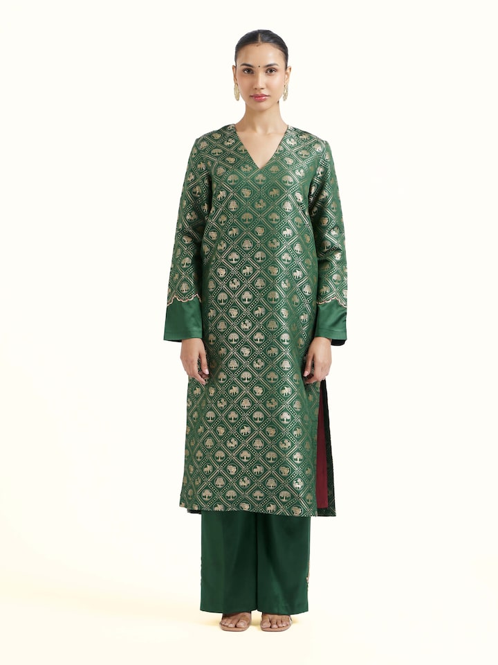 Front view of emerald green Banarasi kurta set with rich woven motifs