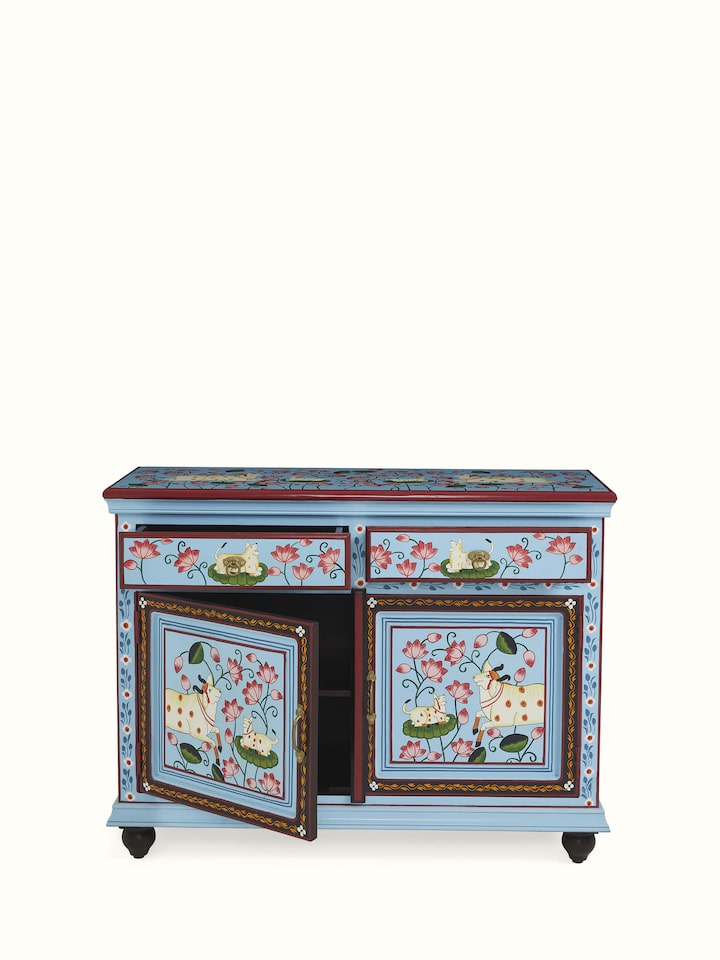 Angled view highlighting carving detail and drawer arrangement – timeless Indian furniture