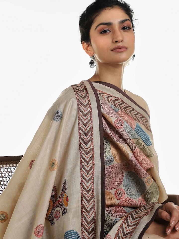 Angled view of beige tussar silk Bankura dupatta highlighting artisanal weave