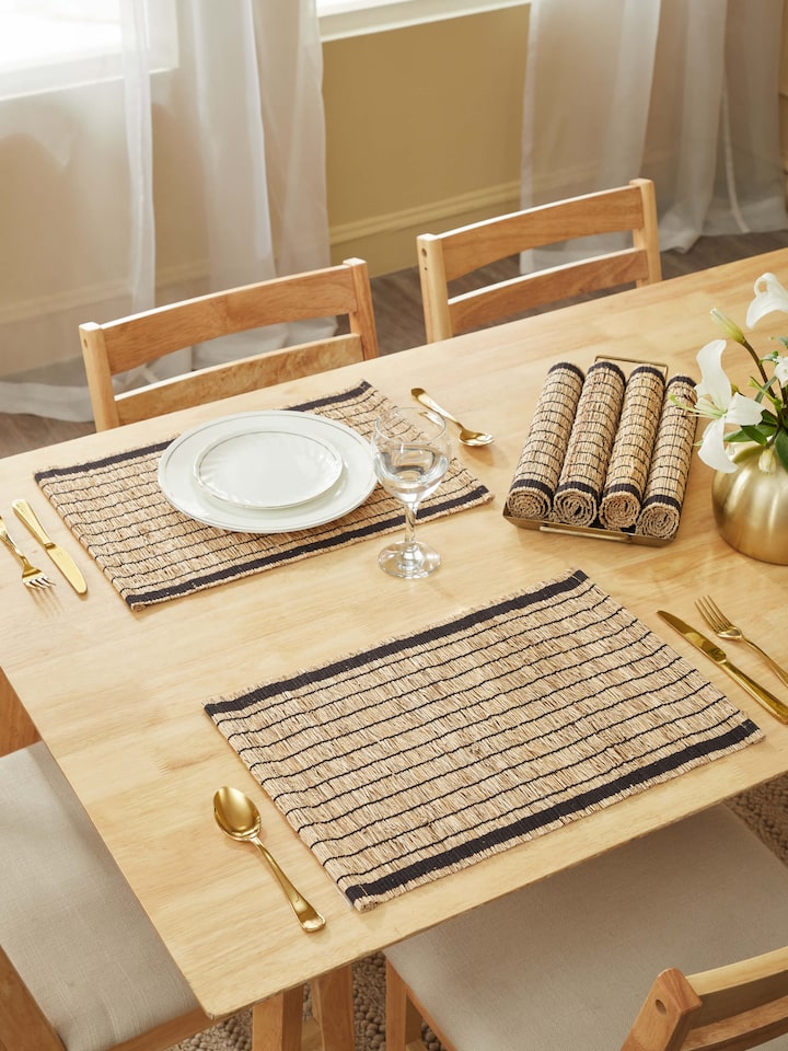 Top view displaying the full round shape and striped design of the table mats
