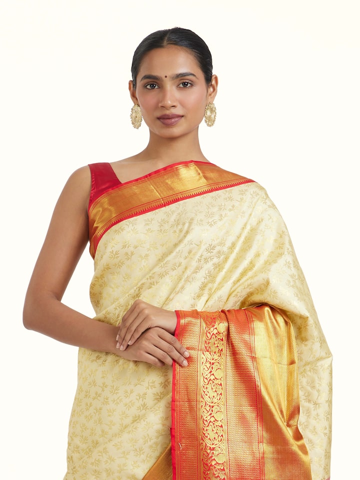 Angled view of the Off-white Silk Dharmavaram Saree