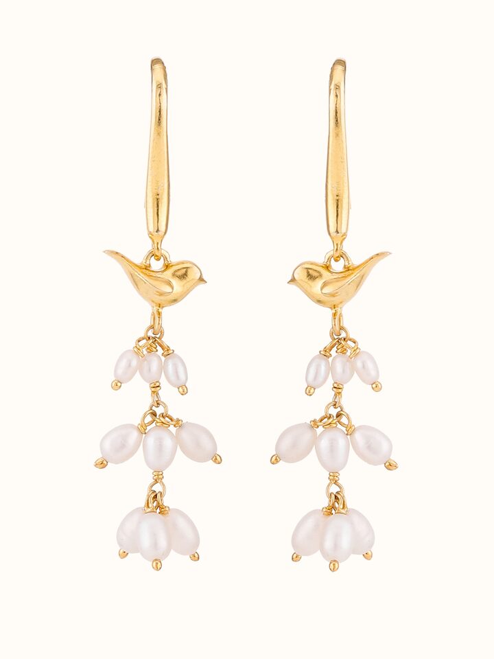front view of silver smithing drop earrings with elegant design