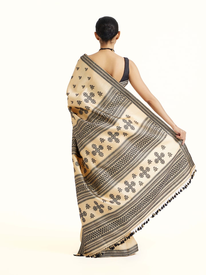 Back view of Beige Tussar Silk Saree emphasizing the overall design and fine details